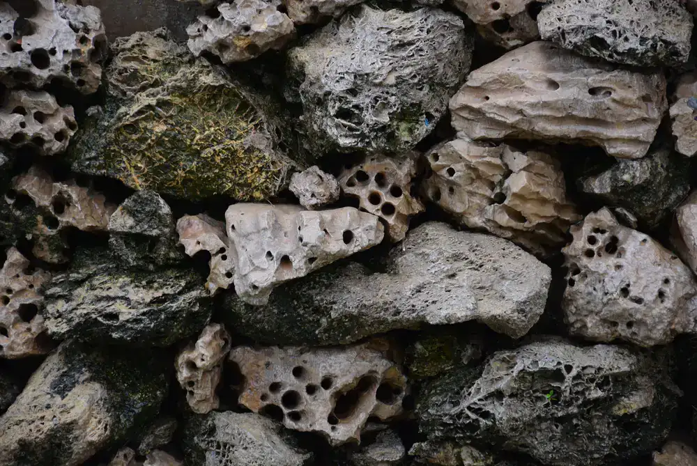 Mini golf hole styled like ancient stone jungle ruins